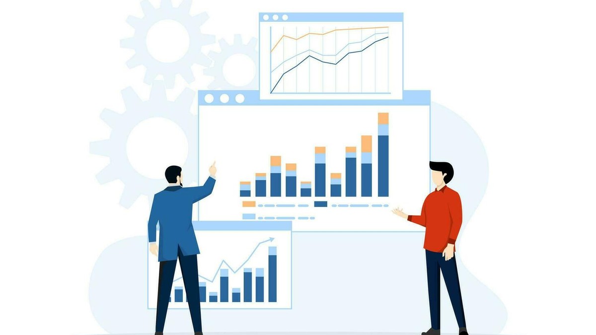 Business team analyzing data on analytics dashboards with charts and graphs